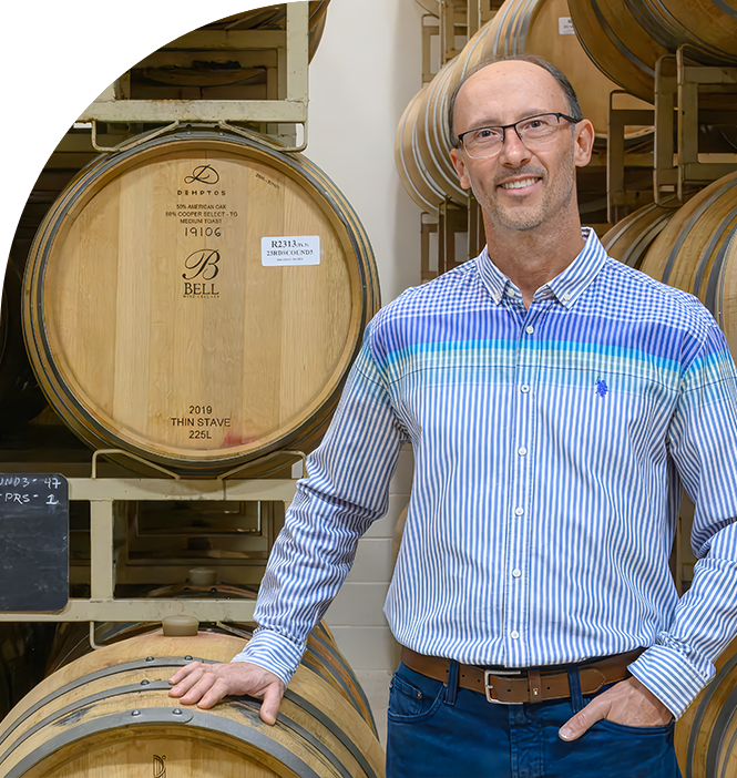 John Hazak, Winemaker & General Manager at Bell Wine Cellars, in the barrel room
